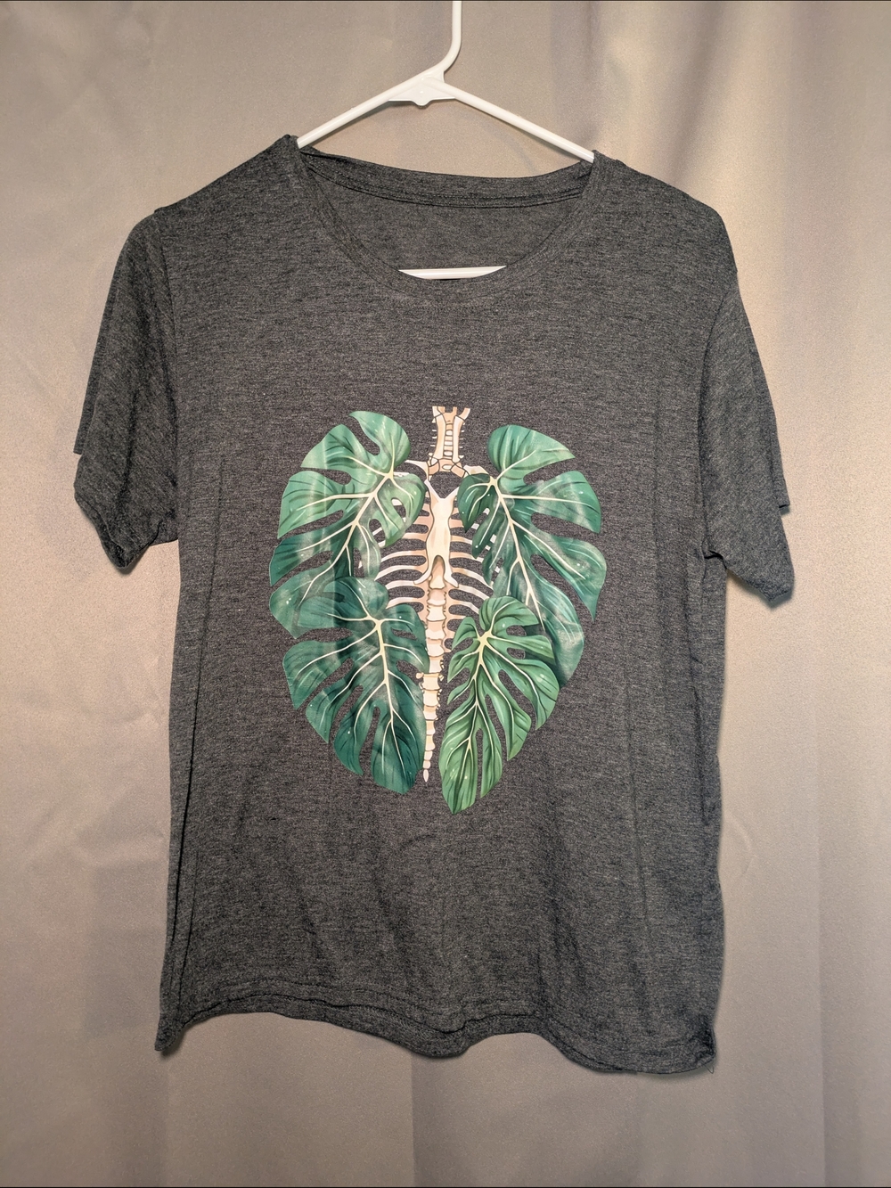 Gray Graphic Tee with Green Monstera Spine Design